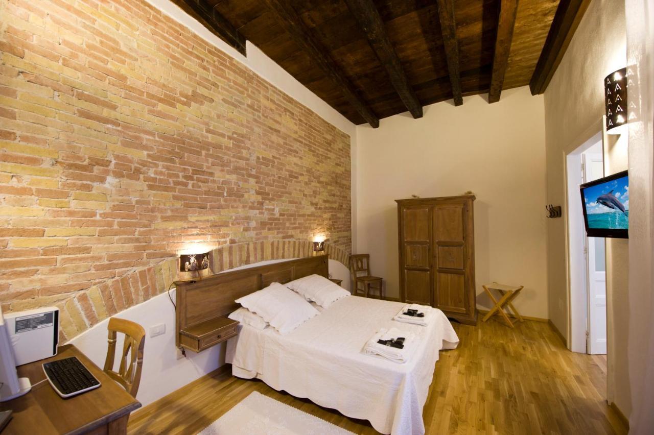 Castelletto Suites Cagliari Værelse billede